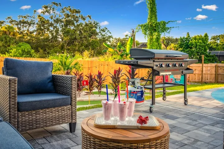 Patio lounge set with milkshakes and grill