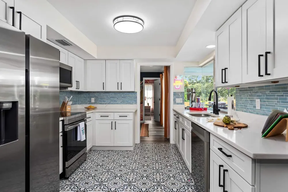 Full kitchen with stainless steel appliances