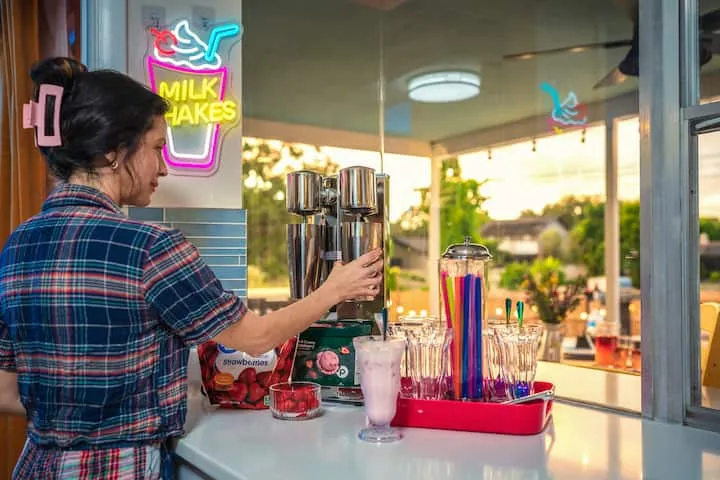 Milkshake station with retro neon sign
