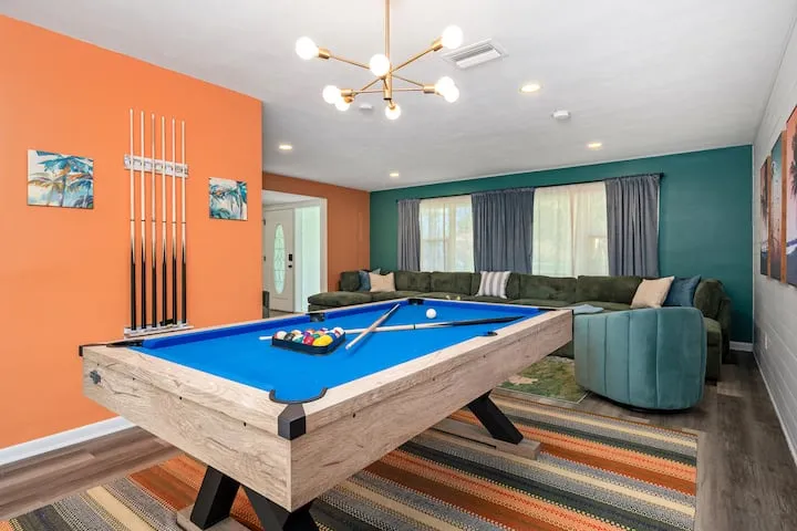 Pool table and sectional from alternate angle